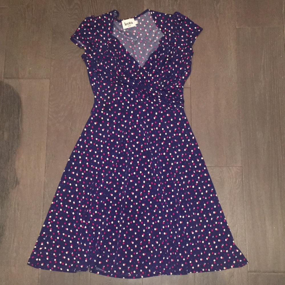 Navy blue wrap dress with polka dots